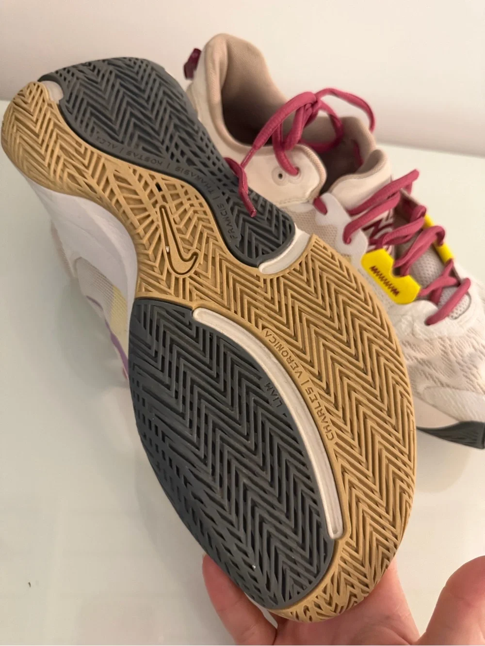 Nike Cream Sneakers with Maroon Laces and Yellow Accents